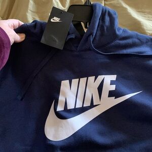 Brand New Navy Nike Sweatshirt with hood and front pocket.  New with tags